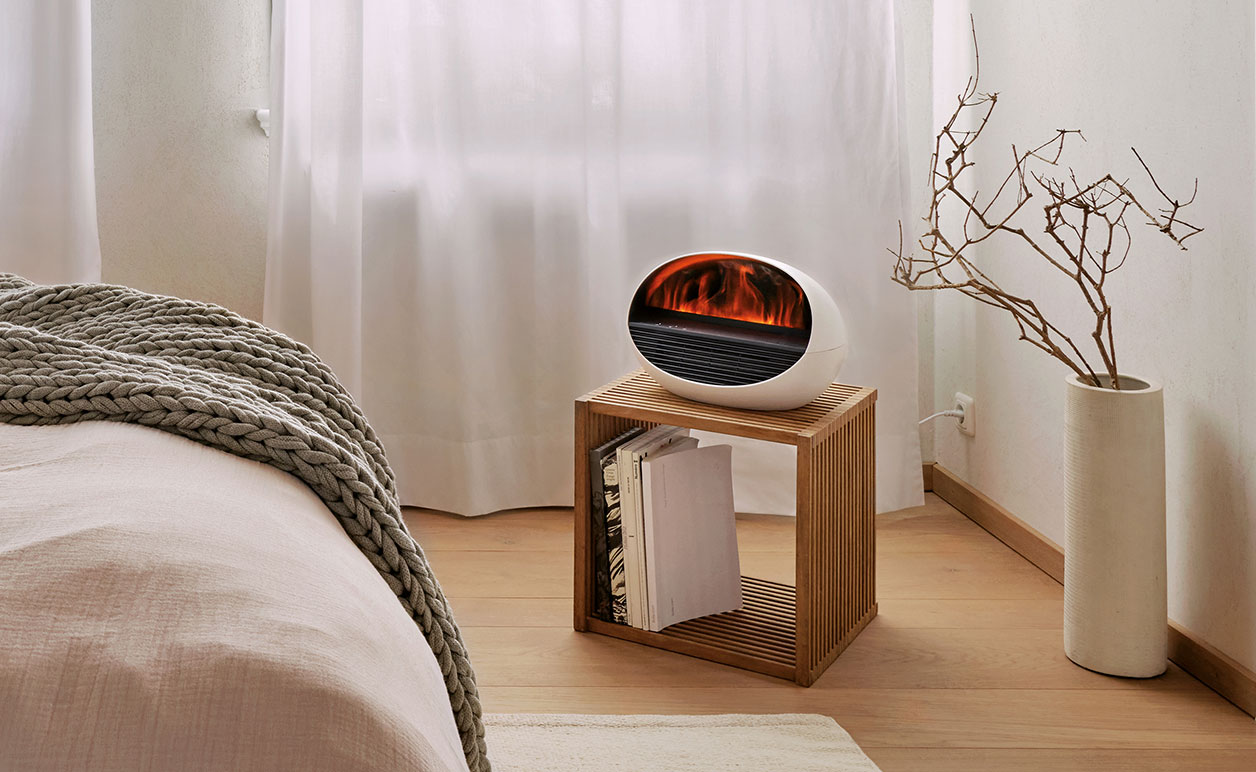 Poczuj magię kominka z Erikiem! Realistyczny efekt płomienia, ciepło i aromat olejk&oacute;w eterycznych w jednym urządzeniu. Wybierz sw&oacute;j kolor ognia i stw&oacute;rz idealną atmosferę w każdym wnętrzu!